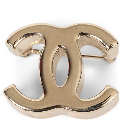 71711 auth CHANEL gold metal 22K CC Brooch - Image 1 of 4