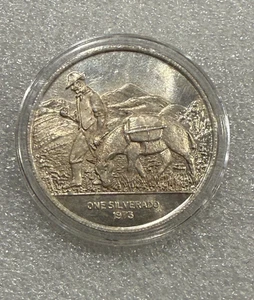 1973 1 oz 999 argento tondo Silverado World Mint Corp Globe Prospector Asino - Foto 1 di 2
