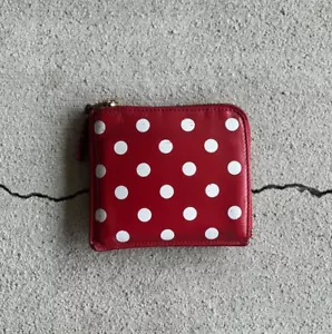Portafoglio COMME des GARCONS in pelle stampata a pois con zip - Foto 1 di 5