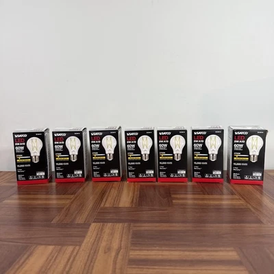 Satco S12414 - 8 Watt LED A19 Clear LED Light Bulbs - 2700K - 120 Volt (7 pack) - Image 1 of 4
