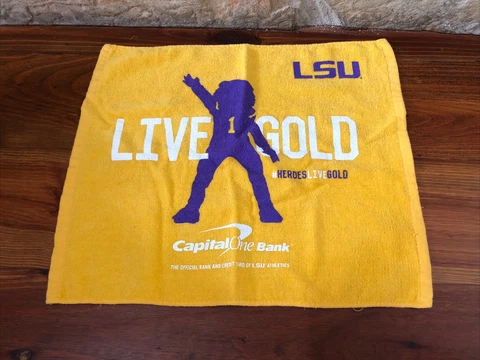 LSU TIGERS LIVE GOLD RALLY TOWEL FROM CAPITAL ONE BANK #HEROESLIVEGOLD FOOTBALL Cover
