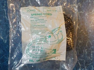 NOS LONG LENGTH BLACK TEL. CO. MODULAR SPRING CORD PART #940012 WI SEALED IN BAG - Picture 1 of 3