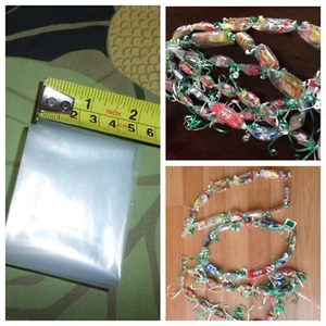 Tubo de plástico de polietileno transparente de 2" para caramelos hawaianos Leis y manualidades de pasatiempos - Imagen 1 de 5