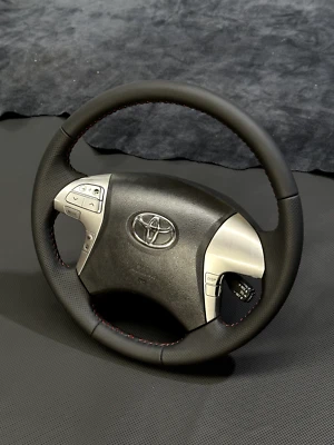 UpHolstered Toyota Hilux N70 Wheel NAPPA Leather - Black - No Airbag or Buttons - image 1 of 3