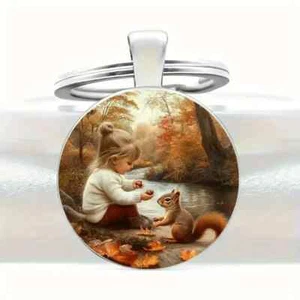 Girl Feeding Squirrel Keychain Key Ring Purse Handbag Car Charm Backpack Bag - Picture 1 of 4