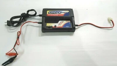 Cargador deportivo Duratrax Onyx 200 AC/DC goteo automático, pantalla de tienda DTXP4201 Foto 1 de 4