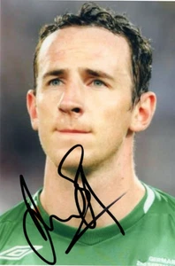IRELAND, NEWCASTLE, BOLTON & LEEDS: ANDY O'BRIEN SIGNED 6x4 ACTION PHOTO+COA - Picture 1 of 1