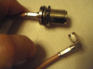 Coax patch jumper cable; SMA 90 deg male to N female bulkhead, 1 ft RG-400/U - Picture 1 of 2