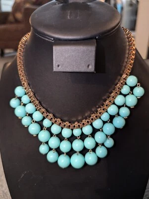 Collar babero turquesa cuentas grandes con cadena de caja tono dorado Foto 1 de 4