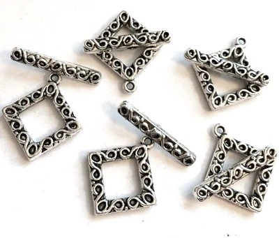 4 juegos de palanca de diamantes de peltre de plata antigua  Foto 1 de 3