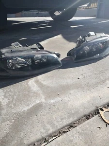 1995 - 1996 Mitsubishi Eclipse Headlights - Picture 1 of 6