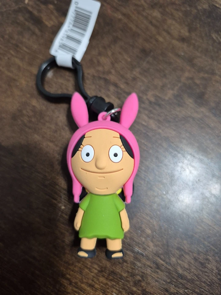 Bolso Ciego Bob's Burgers Serie 1 Llavero Monograma Louie Belcher Foto 1 de 1