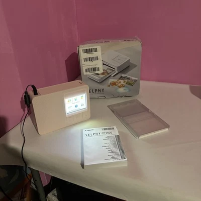 Canon Selphy CP1500 Compact Photo Printer with Wifi Pink (5541C006AA) - Image 1 of 4