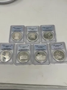 Lot Of 7 PCGS Proof 69 DCAM Silver Dollar Coins - Picture 1 of 7