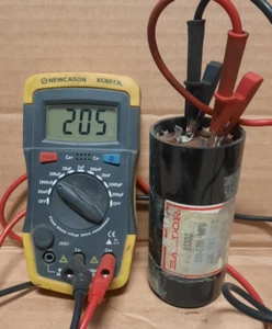 BALDOR #61302 CAPACITOR (216-240 MFD, 230VAC)(2.07” DIA. X 4-3/8” LG.) Q167B - Picture 1 of 4