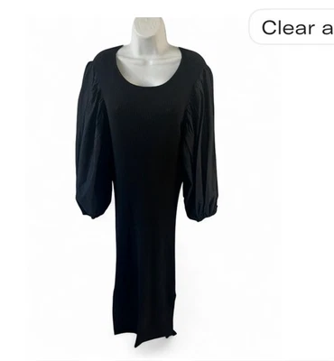 Gipson Latimer Chic vestido negro manga larga. Perfecto para cualquier ocasión. Foto 1 de 4