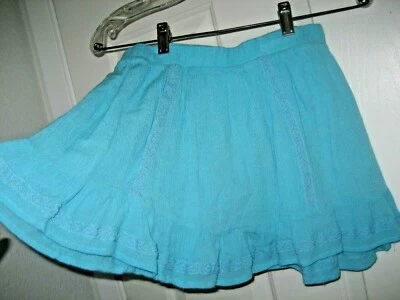 Nueva Mini FALDA MUDD 12 Niñas Azul Aqua Algodón Volantes Dobladillo Encaje Forrado Elástico Completo Foto 1 de 4