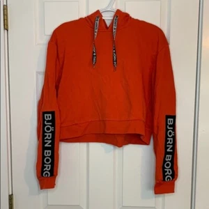 Björn Borg Vibrant Orange Hoodie cropped body - Picture 1 of 8