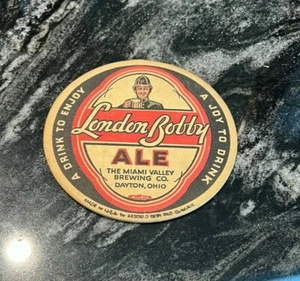 A) VINTAGE LONDON BOBBY ALE 4" BEER COASTER MIAMI VALLEY BREWING DAYTON OH OHIO - Picture 1 of 1