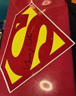 Superman.2 Hats,1 Small Flag,1Watch,1 Metal Plate & Signed Margot Kidder Sticker
