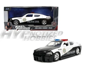 JADA 1:24 2006 DODGE CHARGER POLICE  FAST & FURIOUS DIE-CAST WHITE/BLACK  33665 - Picture 1 of 5