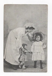 CPA . Altes Mädchen und Spielzeug. Puppe. Werbung A LA MAISON DOREE - Bild 1 von 2