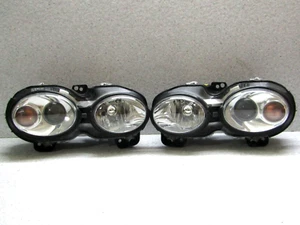Juego de faros proyectores Jaguar X-Type Hella 2006 2009 cromo plateado OEM de fábrica - Imagen 1 de 12