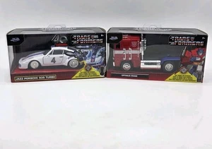 Jada Transformers 1/32 Die Cast Set of 2 Includes Jazz Porsche & Optimus Prime - Picture 1 of 10
