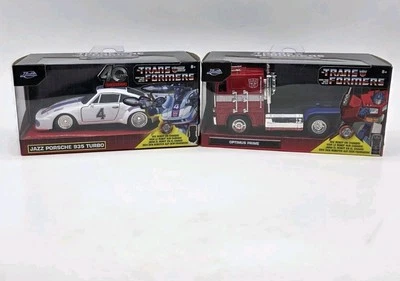 Jada Transformers 1/32 Die Cast Set of 2 Includes Jazz Porsche & Optimus Prime - Image 1 of 4