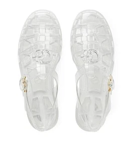 Sandalias planas transparentes transparentes transparentes transparentes transparentes transparentes con logotipo de Gucci $490 - Imagen 1 de 12