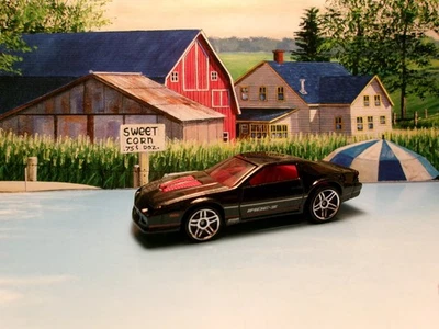 85 Chevy Camaro Iroc-Z 2012 Hot Wheels Nuevos Modelos Serie Negro Foto 1 de 2