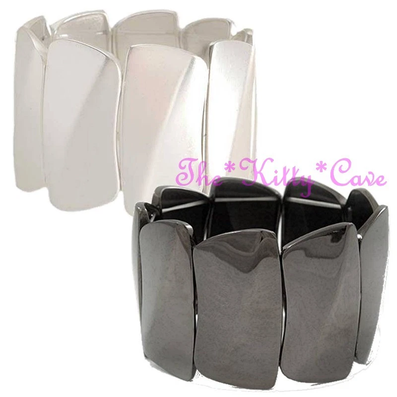 Brazalete elegante elástico elástico geométrico dramático con barras onduladas, placas anchas Foto 1 de 1