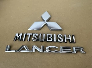 FREE SHIP OEM 08 09 10 11 12 13 14 15 MITSUBISHI LANCER REAR EMBLEM BADGE SET - Picture 1 of 4