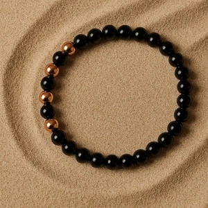 Bracelet Élégance Contrastée – Noir & Cuivre - Foto 1 di 2