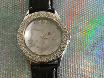 WOMEN'S SANRIO HELLO KITTY ANALOG FASHION WATCH SILVER BLACK LEATHER BAND HK927D - Image 1 of 4