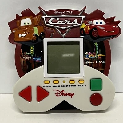 Zizzle Disney Pixar Cars 2007 juego electrónico portátil 5 en 1 probado funciona Foto 1 de 4
