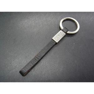 Portachiavi con ciondolo borsa Coach in pelle nero argento AB usato - Foto 1 di 3