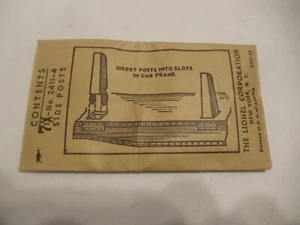 Lionel Postwar 7 No. 2411-4 Seitenpfosten für Flachwagen im Originalumschlag Neu - Bild 1 von 3