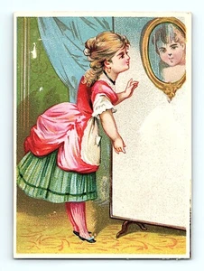 Victorian Trade Card 1880's Young Lady In Red & Green Dress Starts Into Mirror - Bild 1 von 3