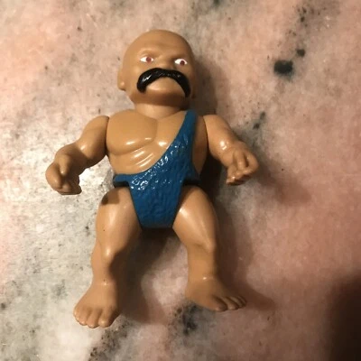 Figura de acción de colección Playskool 1987 Definitely Dinosaurs azul claro CAVEMAN DRON Foto 1 de 4