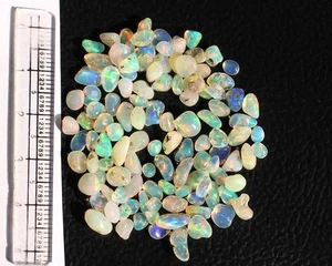 AAA quality Natural Ethiopian opal  Unshape Cab 5*8 MM 100 PC Lot 29.30 Ct - Picture 1 of 3
