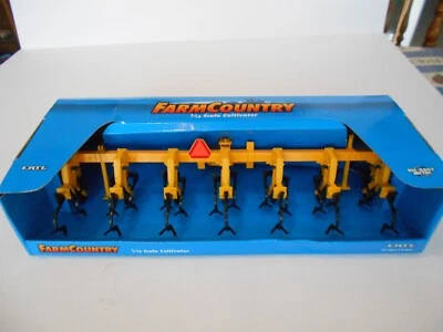 Vintage 1997 Ertl 1:16 Scale Cultivator, #2006 Minneapolis Moline Yellow, NIB - Image 1 of 4