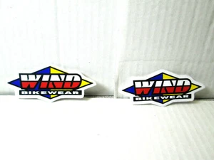 2-1/2" X 1" PAIR WIND RIDEING JACKET MOTORCYCLE RACING VINYL STICKER DECALS - Bild 1 von 3