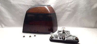 1994 - 2002 VOLKSWAGEN GOLF GTI CABRIO PASSENGER TAIL LIGHT WITH DARK LENS RIGHT - Image 1 of 4
