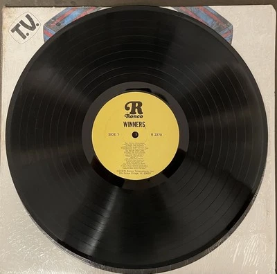 Ronco Volume 11 Winners Vinyl Compilation LP- Alice Cooper/Boston/Barry Manilow - Image 1 of 3
