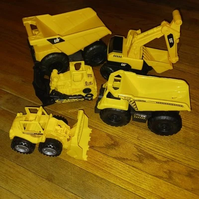 CAT Plastic Toy Construction Vehicles Lot Of 5 - Dump Trucks, Dozer, Loader - Image 1 of 4