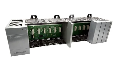 Fuente de alimentación Allen Bradley 1746-P2 Ser C con 1746-A13 Ser B 13 ranuras rack y espacios en blanco Foto 1 de 4