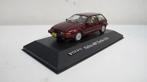 1:43 ATLAS VOLVO 480 TURBO USA COUPLE PURPLE DIECAST CARS - Picture 1 of 6