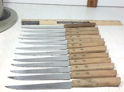 Lote 12 CUCHILLOS PARA CARNE PARKER BROTHERS CHATTANOOGA TN MANGO DE MADERA BORDE DENTADO Foto 1 de 4