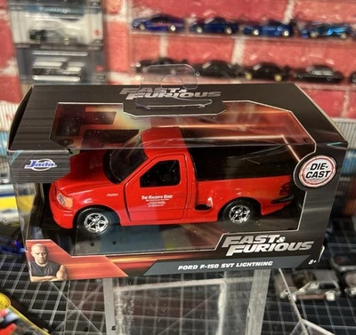Jada FAST & FURIOUS BRIAN'S FORD F-150 SVT LIGHTNING PICKUP RED 1/32 MODEL - Image 1 of 2